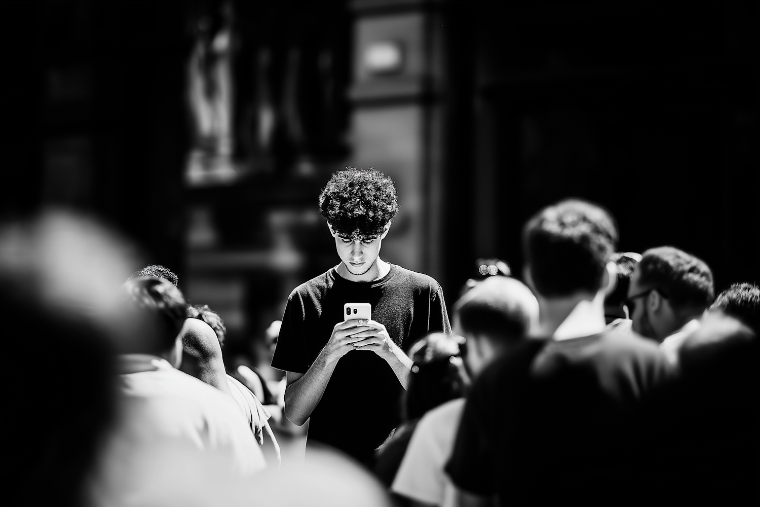 A student attempts to focus on digital learning, surrounded by multiple open tabs and notification pings, illustrating the challenge of maintaining attention in the modern world.