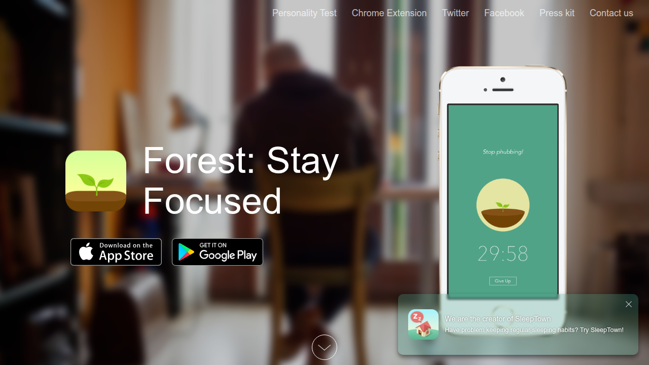 A screenshot of the Forest app showing a focus session in progress, with a virtual tree growing.