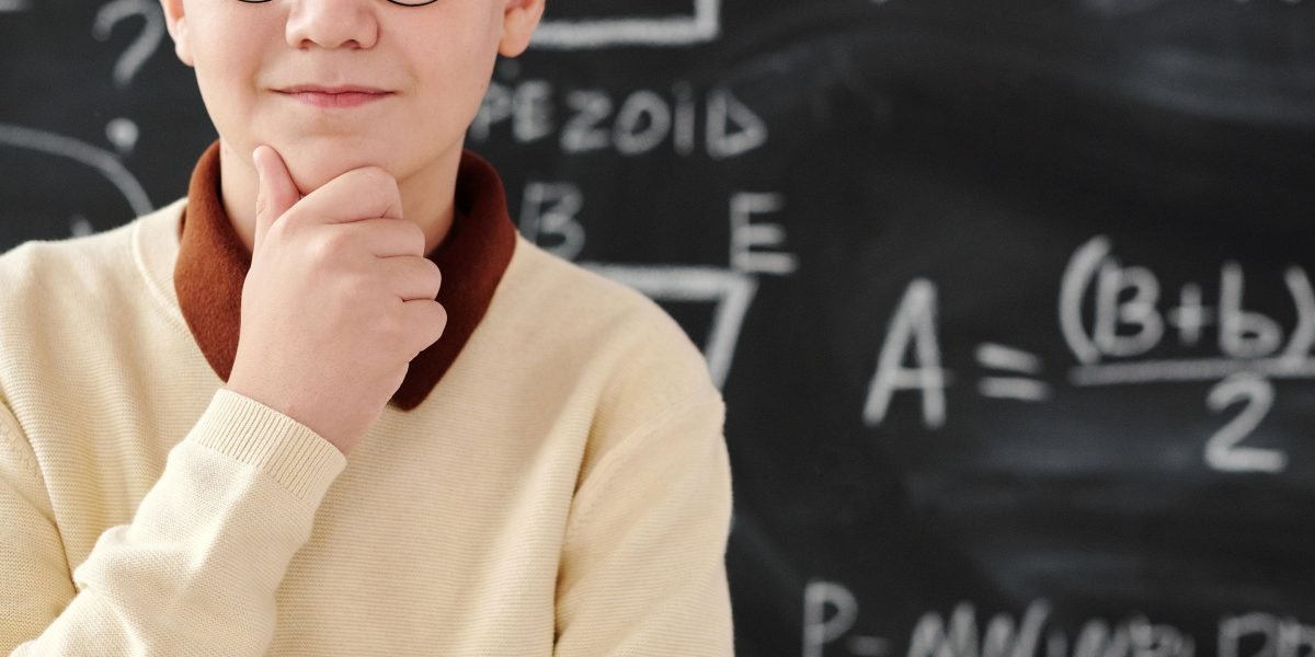 A person demonstrating clarity and focus, having overcome a challenge or found a solution.