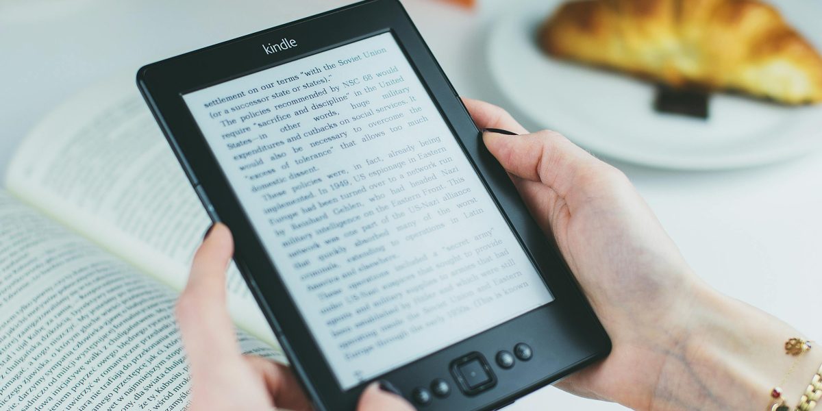 A reader struggling with poorly formatted ebook content, highlighting the importance of a smooth conversion.