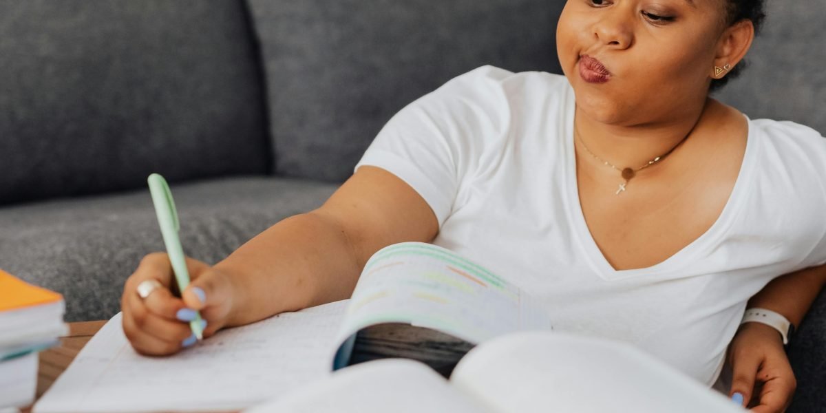 A person demonstrating deep concentration during a study session, signifying improved focus and learning.
