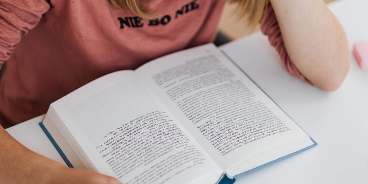 A person engrossed in learning or deep thought, representing the brain-rewiring benefits of focused reading.