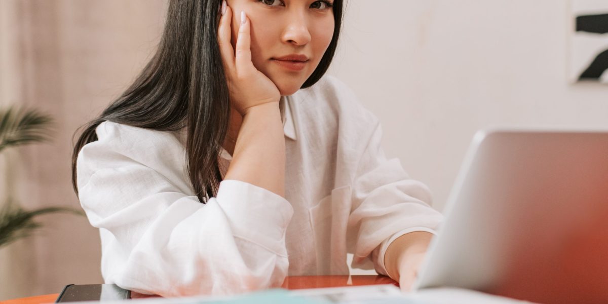 A person deeply engrossed in their work, showing intense concentration and uninterrupted attention.