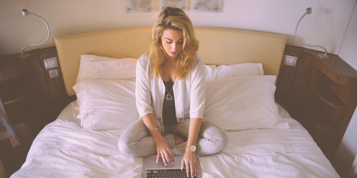 An individual fully immersed in a task, demonstrating the intense focus required for deep work sessions.