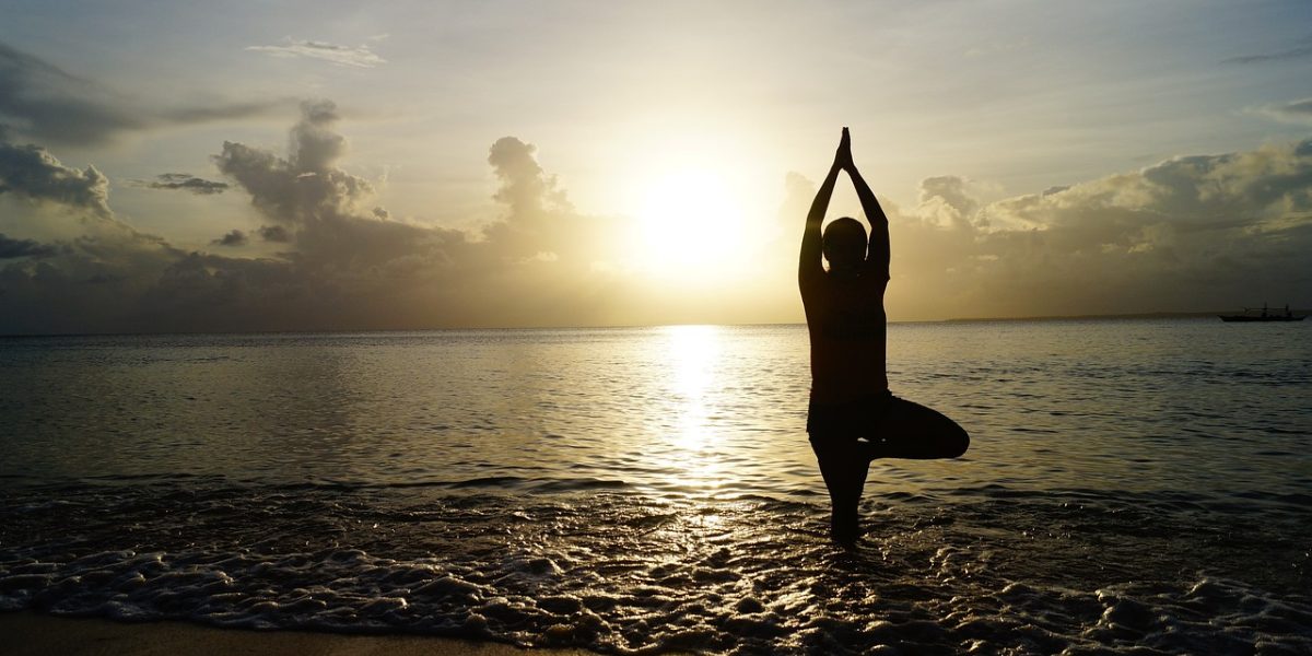 A person engaged in mindful meditation, practicing awareness to improve focus and mental clarity.