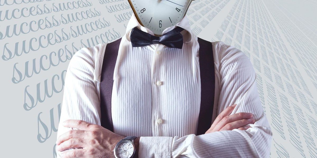 A person organizing their work schedule or calendar, representing intentional planning and time management.